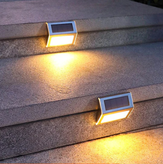 Luces LED Con Panel Solar Para Escaleras Exteriores (Pack De 2 Pzas). Luz Cálida Amarilla 3 LED En Acero Inoxidable De Pared O Escalera.