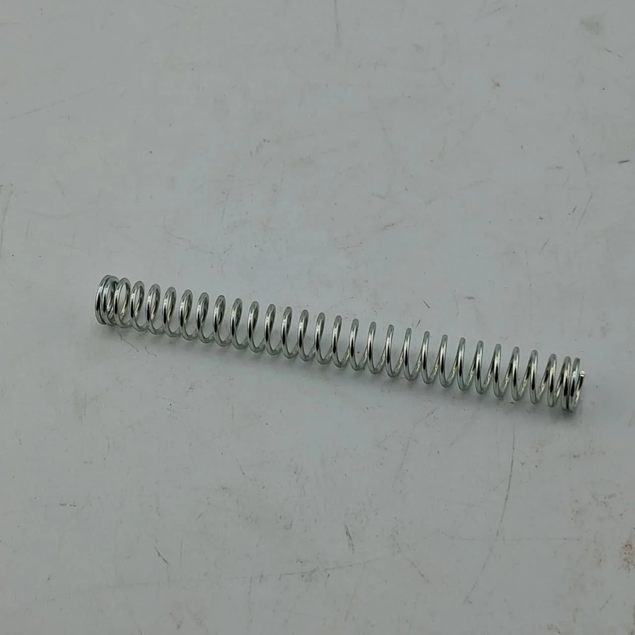 Resorte Freno Trasero (RKG150) (CODIGO ANTERIOR MO-REP-40274J040100)